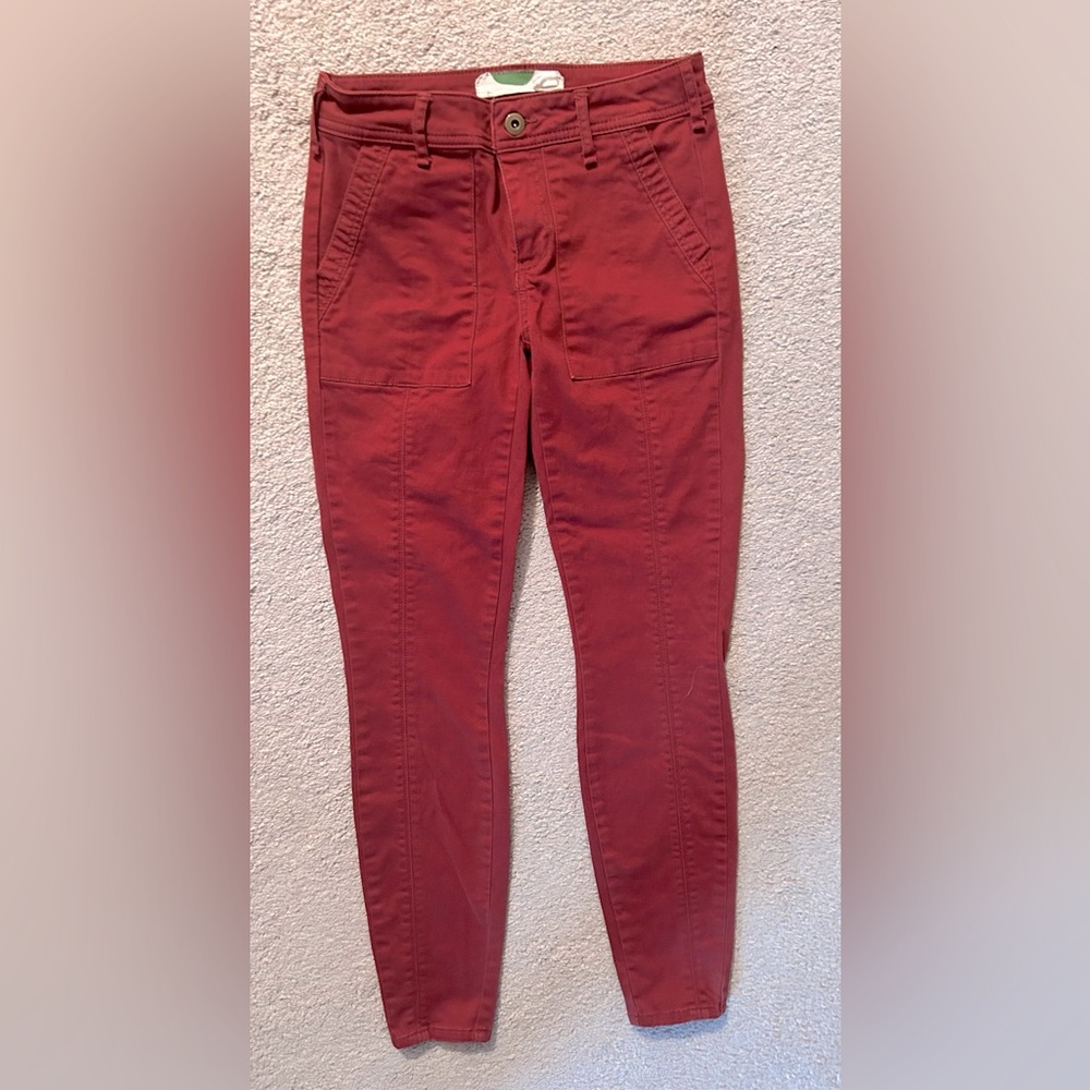 Anthropologie burnt orange slim fit pants.